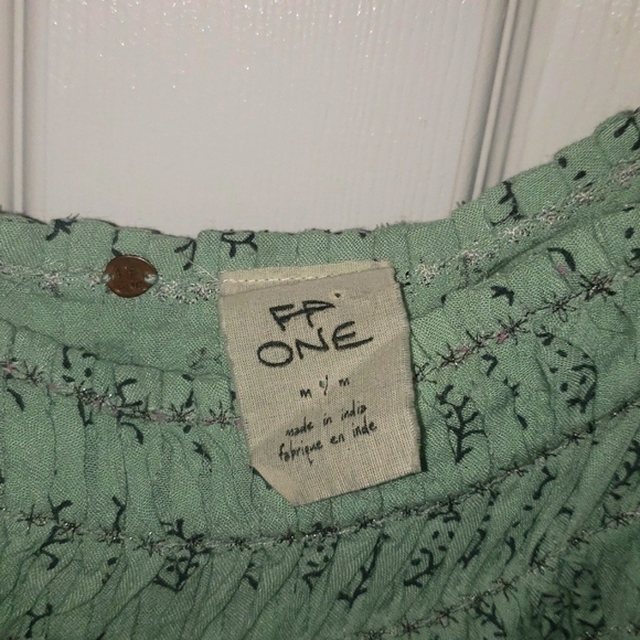 NWOT Free People  whimsical  dress with laces up the side.  Size M. NWOT - Picture 4 of 7